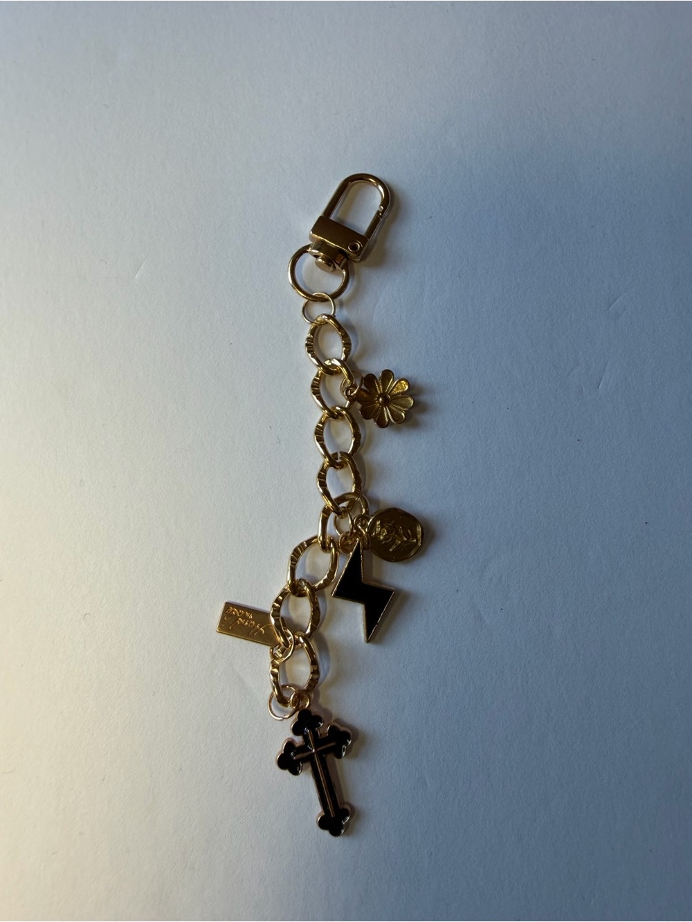 Gold-Tone Charm Bag Charm with Cross, Flower & Lightning Charms